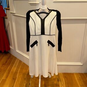 Black and white dress with long sweater sleeves, A-line skirt